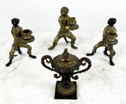 ANTHROPOMORPHIC MONKEY CANDLESTICKS, a pair, and one other along with a cast bronze urn table