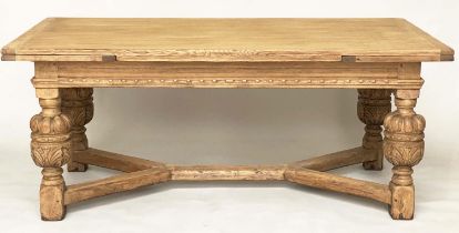 DRAWLEAF EXTENDING DINING TABLE, English style oak, with notch carved frieze raised on broad