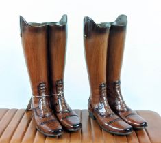 STICK STANDS, a pair, in the form of riding boots, polychrome resin, 48cm H, (2)