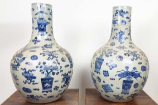 BOTTLE VASES, 58cm high, a pair, Chinese Export style, blue and white ceramic. (2)