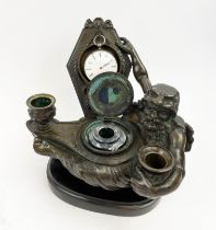 MAISON GIROUX PARIS BRONZE WATCH STAND, late 19th century incorporating a central inkwell and two