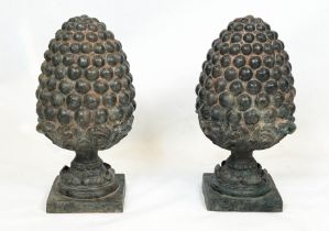 BRONZE PINEAPPLE GARDEN FINIALS, a pair, in a verdigris finish, 60cm H. (2)