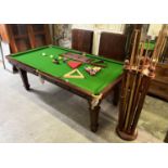 E.J. RILEY SNOOKER DINING TABLE, mahogany top in four leaves over a green baize and slate top on