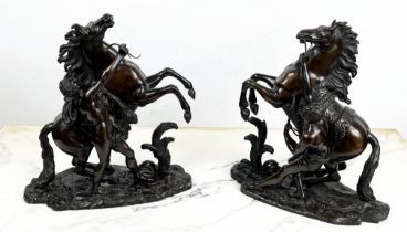 BRONZE MARLY HORSES, a pair, 26cm H x 24cm L. (2)