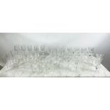 A QUANTITY OF CUT GLASS, including six cut glass wine glasses, nine claret glasses, champagne flutes