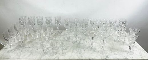 A QUANTITY OF CUT GLASS, including six cut glass wine glasses, nine claret glasses, champagne flutes