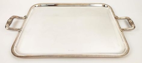 A CHRISTOFLE SILVER PLATED TWIN HANDLED SERVING TRAY, leaf motif border, 62cm x 39cm.