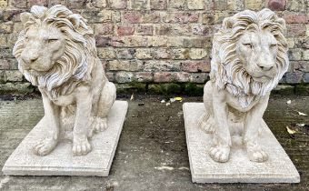 SCULPTURAL SEATED LIONS, a pair, composite stone, 69cm H. (2)