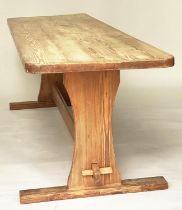 HARVEST DINING TABLE, mid 20th century Oregon pine rectangular with trestle ends and stretcher