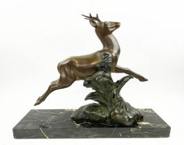 A SOLEALL BRONZE DEER, Art Deco on black variegated marble base, 52cm L x 41cm H.