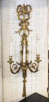 WALL SCONES, a pair, each 115cm H x 38cm W, brass, with swagged, ribbon detail. (2)