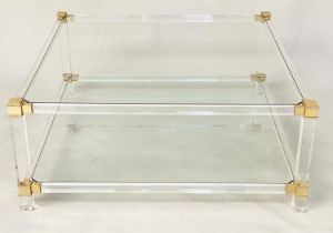 LUCITE LOW TABLE, 1970s square lucite framed with gilt corners and two tier glass shelves, 99cm x