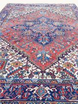 ANTIQUE PERSIAN HERIZ CARPET, 315cm x 250cm.