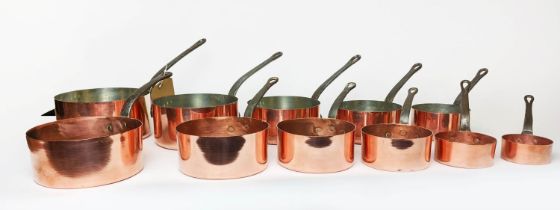 BATTERIE DE CUISINE, set of eleven graduated copper pans, largest 17.5cm diam. (11)