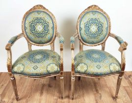 FAUTEUILS, a pair, each 60cm x 101cm H, Louis XVI style with carved showframes and gilt detail in