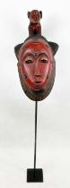 BAOULE CASQUETTE MASK, from Ivory Coast. 130cm H