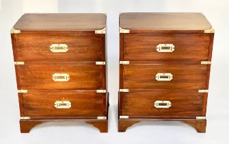 BEDSIDE CHESTS, a pair, campaign style mahogany and brass bound each with three drawers, 47cm x 61cm