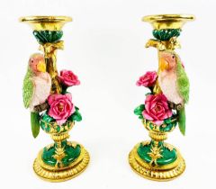 PARROT FIGURAL GARNITURE, a pair, 30cm high, 13cm diameter, painted resin. (2)