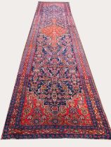 ANTIQUE NORTH WEST PERSIAN RUNNER, 490cm x 103cm.