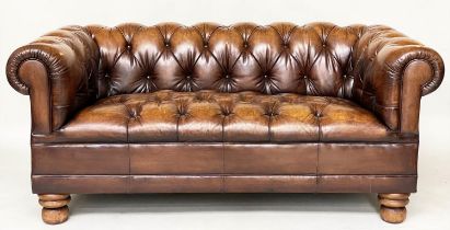 CHESTERFIELD SOFA, 180cm W, nicely aged mid brown buttoned leather with curved back and arms.