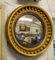 CONVEX MIRROR, 49cm diam., Regency giltwood and gesso frame.