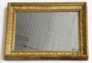 WALL MIRROR, early 20th century giltwood and gesso rectangular with anthemion motif decorated frame,