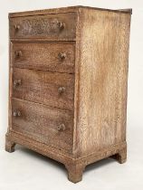 HEALS CHEST, early 20th century limed oak with Gothic Tracery carved drawer above three long drawers