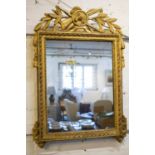 WALL MIRROR, French Louis XVI giltwood with boars head surmount and rectangular plate, 70cm x 48cm.