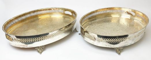 SERVING TRAYS, pair, silver plated, twin handled form, pierced gallery sides, engraved surfaces,