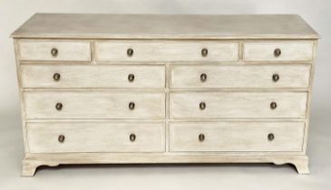 LOW CHEST, George III design traditionally grey painted with nine drawers and bracket supports, 77cm
