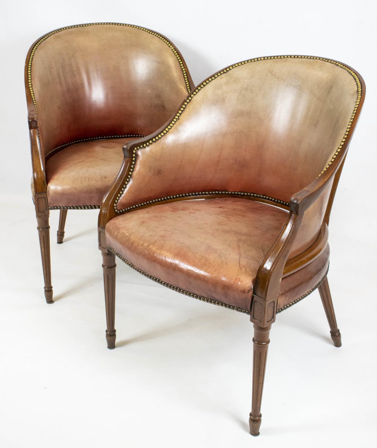 LIBRARY TUB CHAIRS, 85cm H x 62cm, a pair, George III style mahogany and leather upholstered. (2)