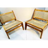 LOUNGE CHAIRS, a pair, 1960's Danish style 66cm high, 60cm wide, 74cm deep, canework seat and back.