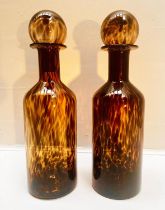 DECANTERS, a pair, 53cm high, 14cm diameter, , Murano style glass. (2)