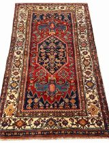 ANTIQUE PERSIAN BIJAR RUG, 215cm x 125cm.