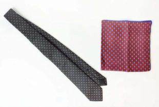 GUCCI TIE, silk, with GG iconic pattern, 148cm x 7cm together with a pocket square/handkerchief,