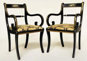 ARMCHAIRS, a pair, Regency design, gilt and lacquered with 'Safari' fabric upholstered cushions (