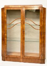 ART DECO DISPLAY CASE, walnut with a pair of glazed doors enclosing shelves and glazed side