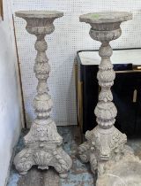 TORCHERES, a pair, each 130cm H, carved wood, in a grey distressed finish. (2)