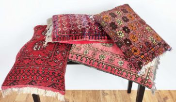 CUSHIONS, a set of four, various sizes and designs, 67cm x 44cm. (4)