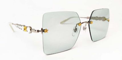 GUCCI SUNGLASSES, rimless square lenses set into the frame with star details and crystals feature