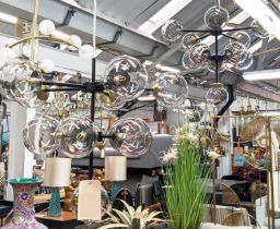 CEILING LIGHTS, a pair, 1950s Italian style, each eleven branch, clear glass ball shades. (2)