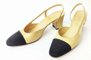 CHANEL CLASSIC TWO TONE SLINGBACK HEELS, leather body with iconic black grossgrain capped toe,