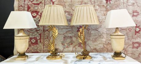 SPIRAL LEAF LAMPS, a pair, gilt finish and a pair of urn lamps, neo-classical style cream and gilt