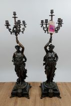 AFTER JEAN-LOUIS GRÉGOIRE CANDELABRA, a pair, 93cm H each. (2)