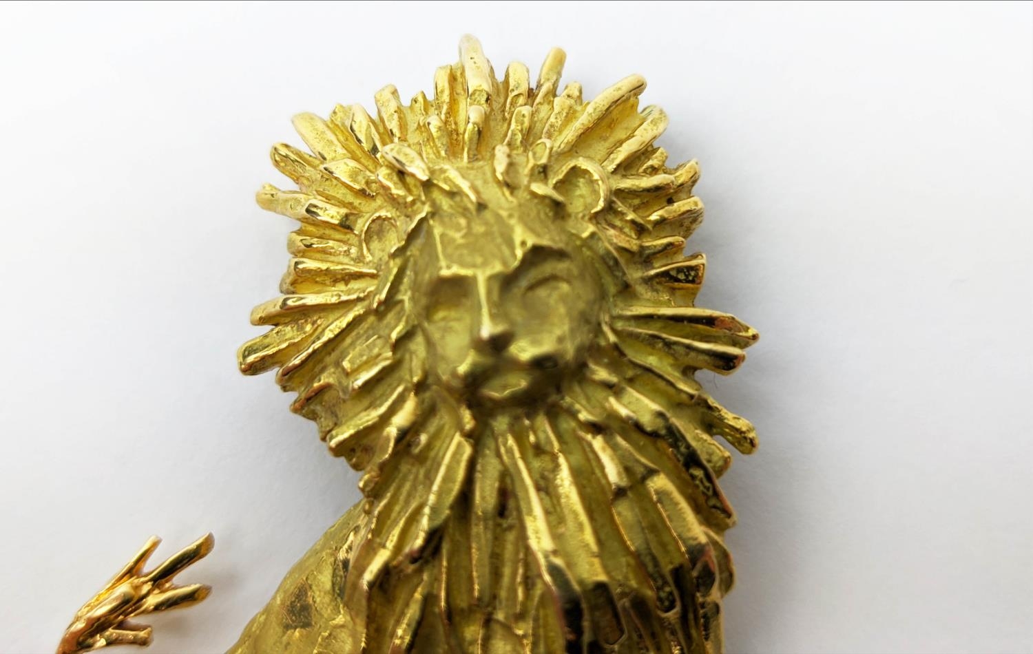 AN 18CT GOLD 'CHAUMET' LION BROOCH, textured finish, made in parts, 33.38 grams, probably 1970s. - Image 5 of 9