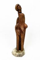 BAHMAN FORSI (Iran, b.1934), 'Figure study', carved wood, 67cm H (including stand) on onyx base.