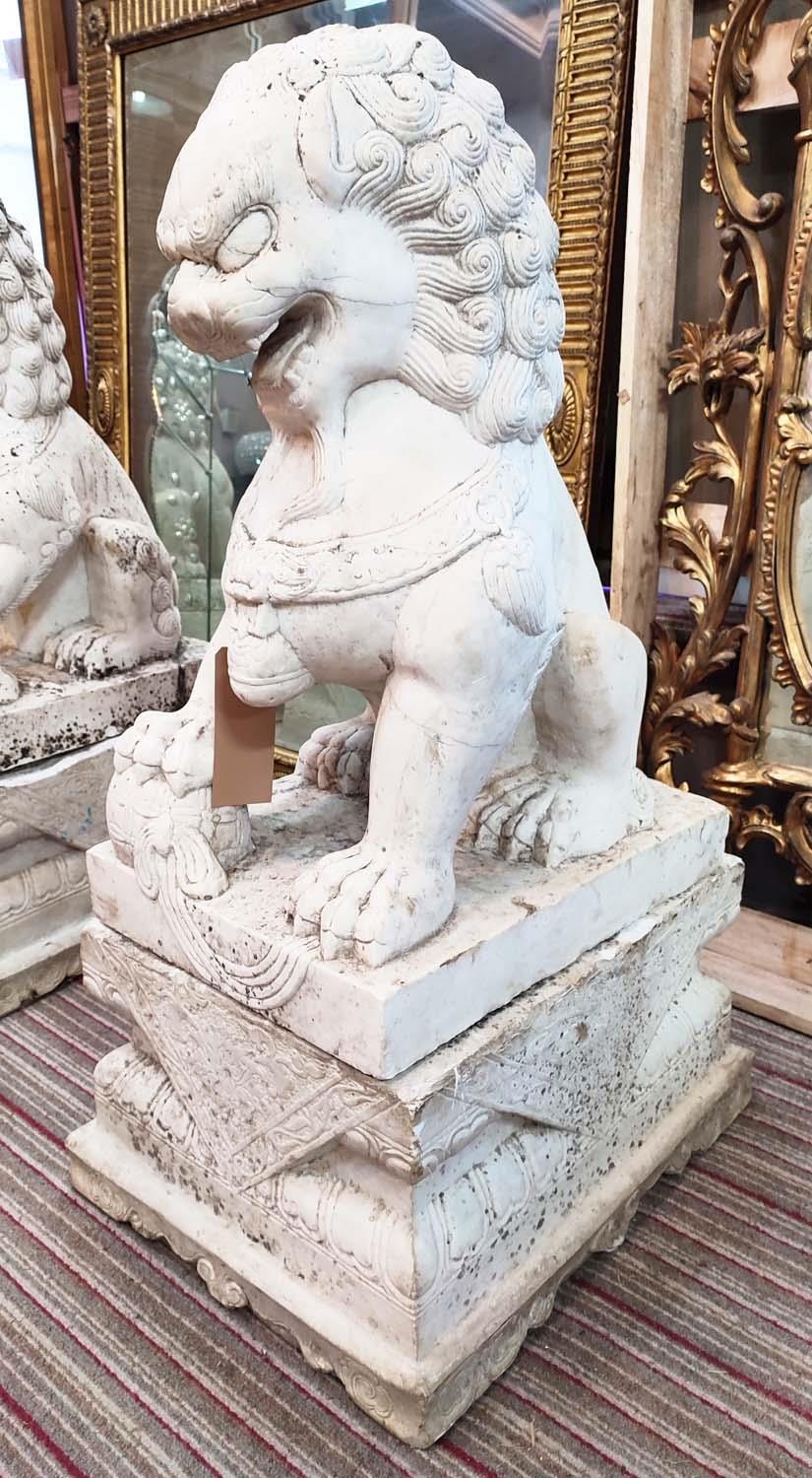 MARBLE GARDEN FOO LIONS, a pair, early 20th century on plinths, 102cm H x 58cm D x 45cm W. (2) - Image 2 of 7