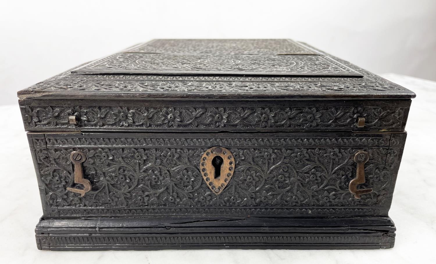 JEWELLERY BOX, 19th century Anglo-Indian ornately carved ebony with hinged lid and fitted - Image 7 of 8