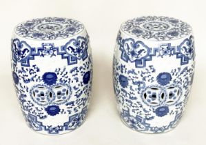 CHINESE BARREL STOOLS, a pair, blue and white ceramic with pierced tops, 47cm H. (2)