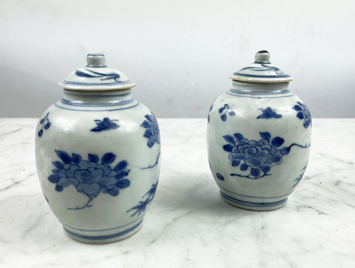 HATCHER CARGO SMALL LIDDED VASES, a pair, in blue and white foliate decoration, 13cm H. (2) - Image 7 of 7